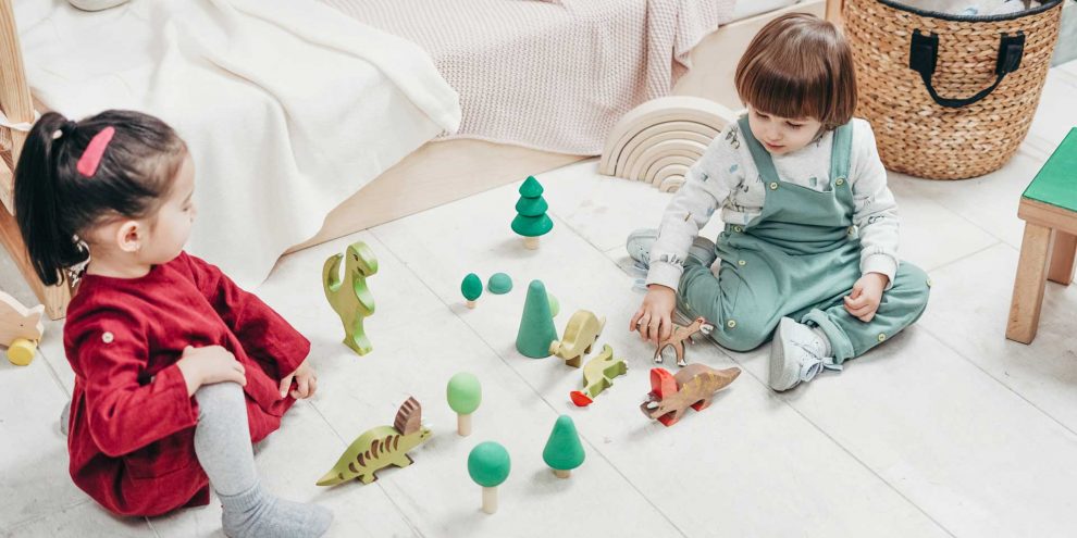 Canva—Children-Playing-Wooden-Toys